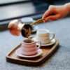 Pouring Specialty Turkish Coffee in to the Pink color porcelain Loveramics Bond Ibrik Cup