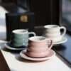 Loveramics Bond Ibrik cups in three colors, charcoal, ivory and pink.